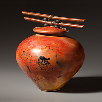 Linda Dalton jar with bamboo handle.
