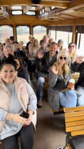 Sandhills Trolley filled with happy waving people